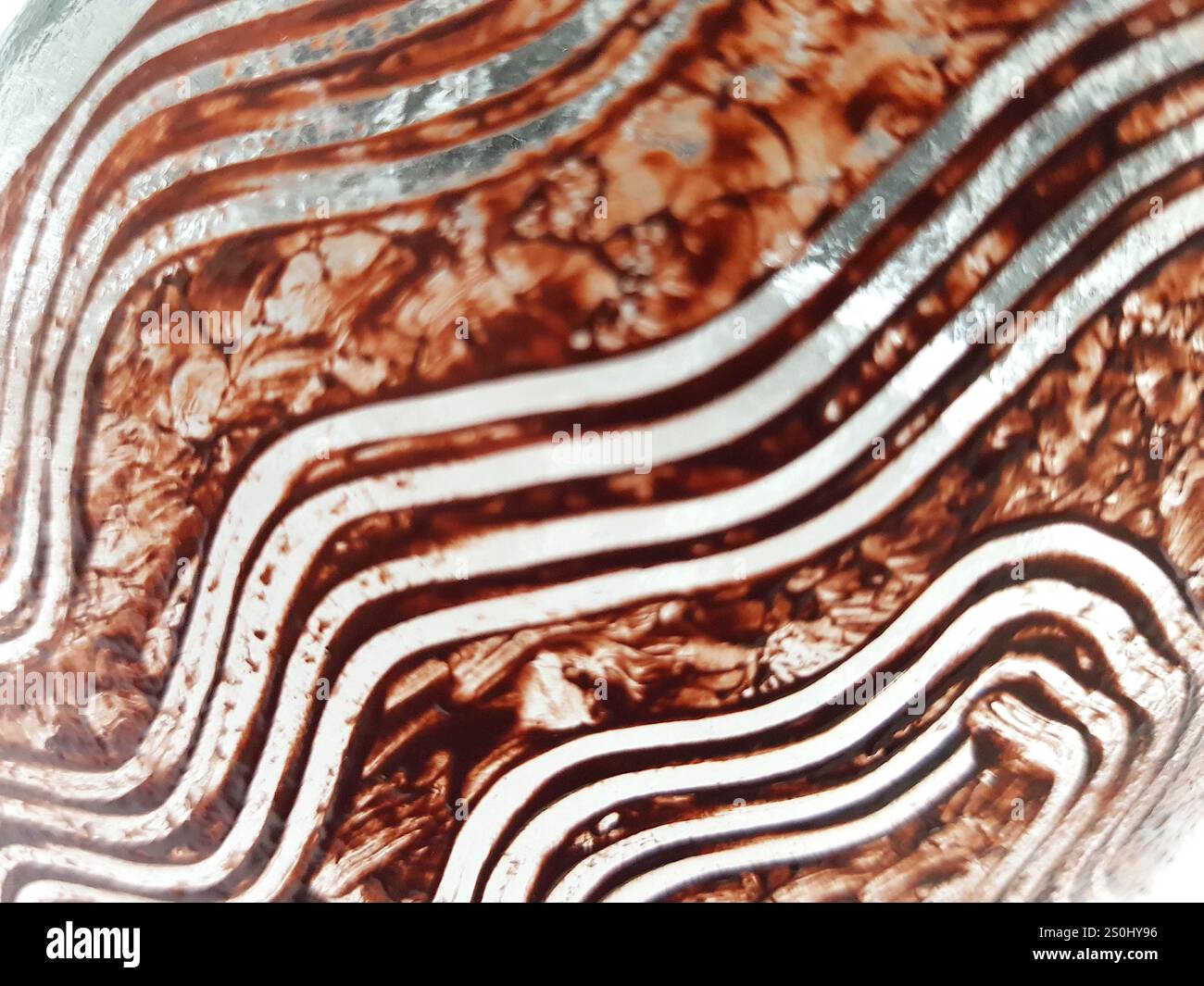 Un primo piano di vetri decorativi che creano uno sfondo etnico astratto. Foto Stock