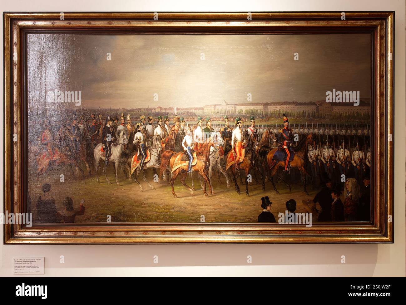 Vienna, Austria. 12 dicembre 2024. Museo di storia militare, Istituto di storia militare di Vienna, sfilata sul Josefstadt Glacis in occasione della visita del principe ereditario di Württemberg il 10 maggio 1845, al centro del giovane arciduca Francesco Giuseppe (nel 1848 l'imperatore Francesco Giuseppe i), artista anonimo, olio su tela intorno al 1845/46 Foto Stock