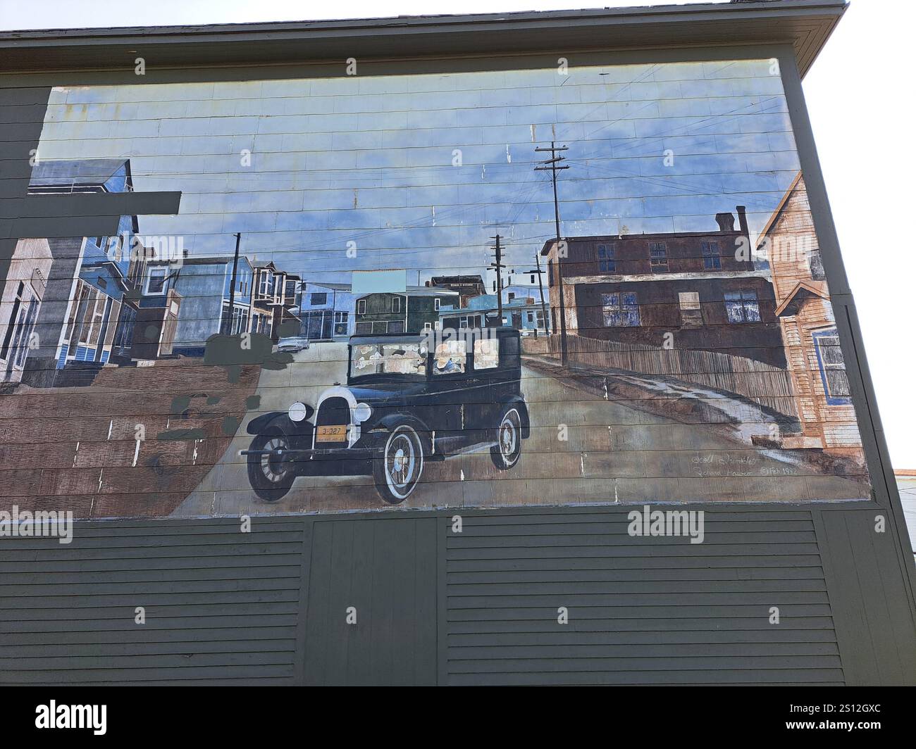 Murale che raffigura la storia della città di Wabana sull'isola Bell, Terranova e Labrador, Canada Foto Stock