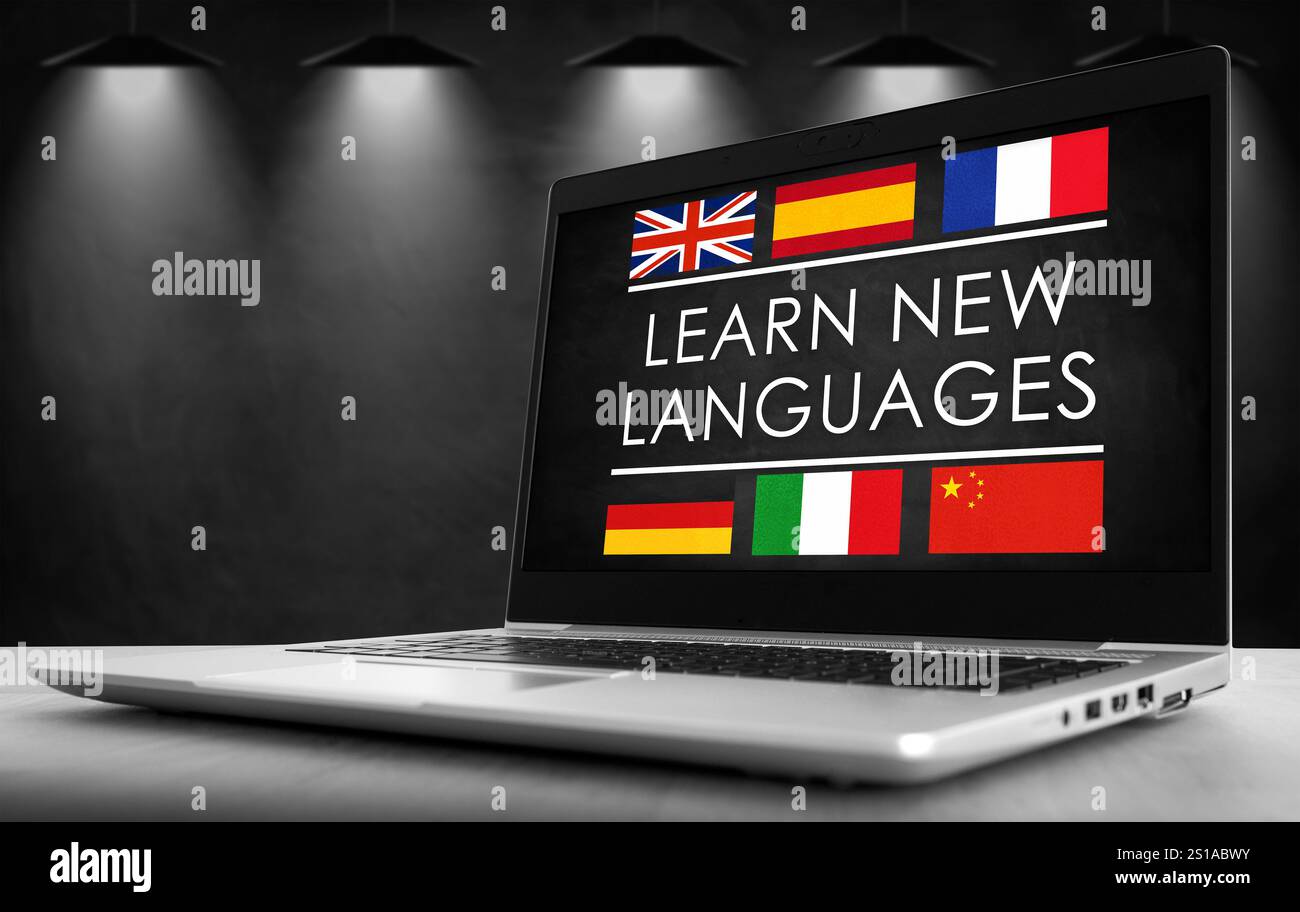 Impara nuove lingue - slogan scritto sul notebook Foto Stock