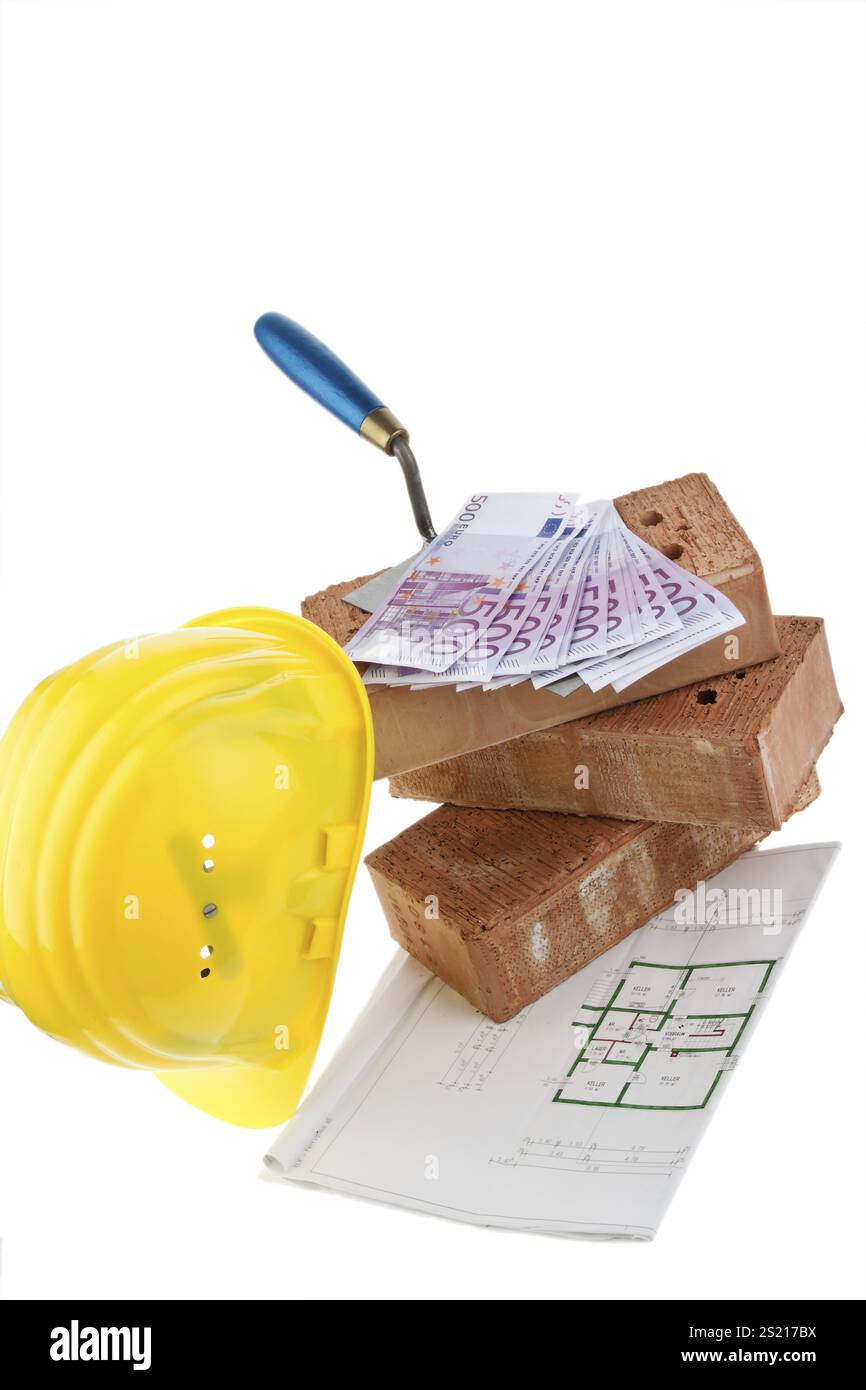 Foto di Symbol costruzione di case, finanziamenti, risparmio di società edile. Mattoni ed euro Austria Foto Stock