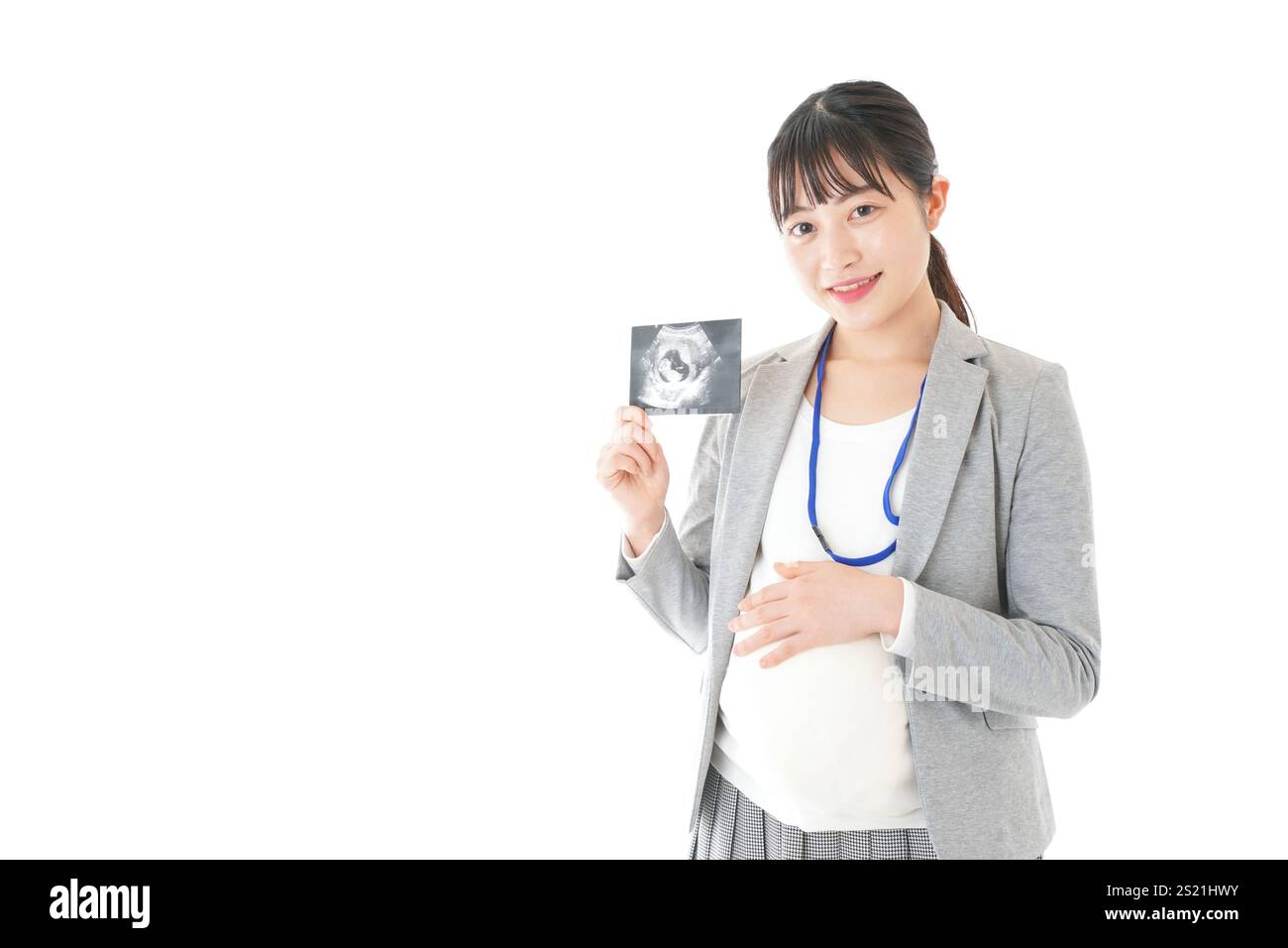 Donna d'affari incinta con immagine eco Foto Stock