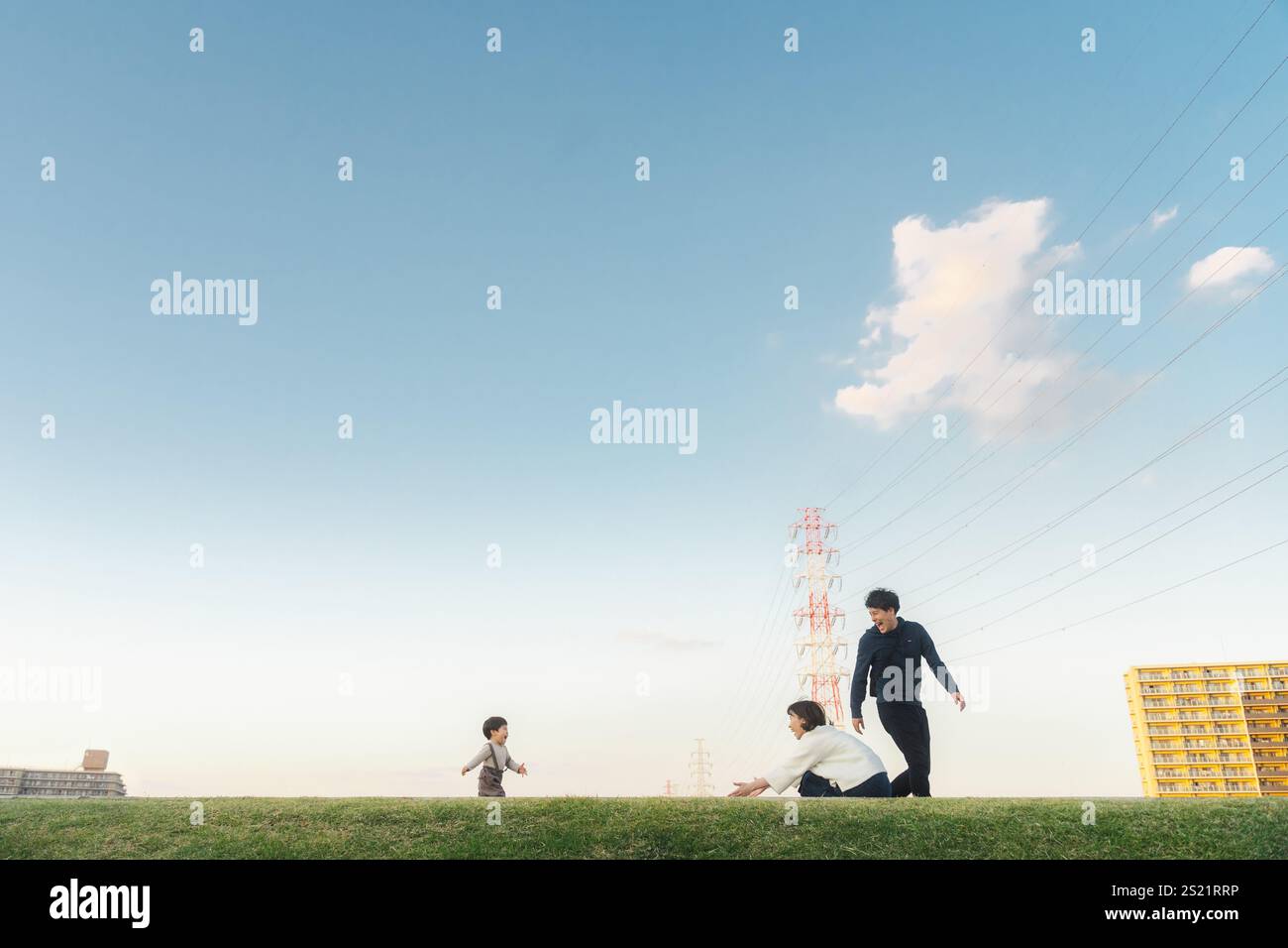 Foto di famiglia al tramonto Foto Stock