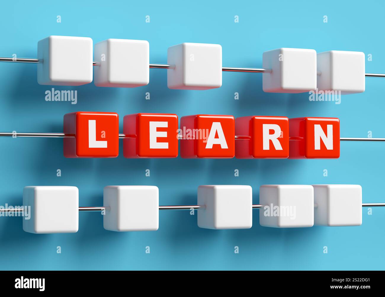 I cubi rossi che formano la parola imparano enfatizzando il concetto di apprendimento e studio. Concetto educativo. Foto Stock