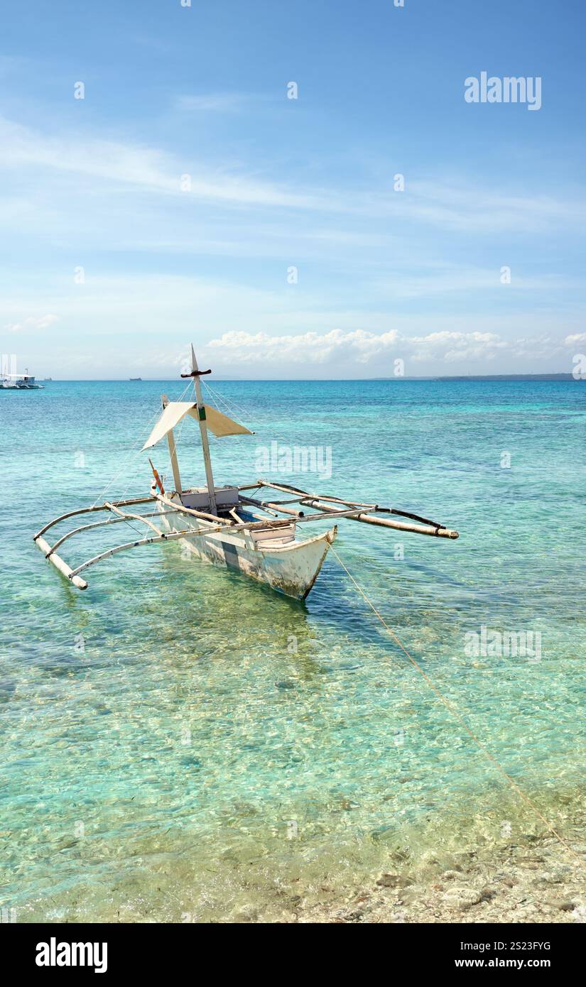 Bangka sulla riva dell'isola di Malapascua, Filippine. Foto Stock