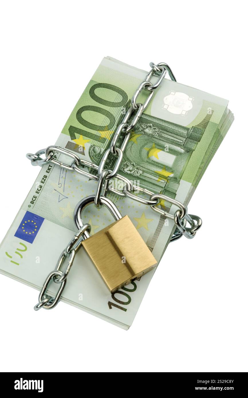 Banconote in euro con catena e lucchetto foto simbolica per la sicurezza e l'inflazione. Austria Foto Stock