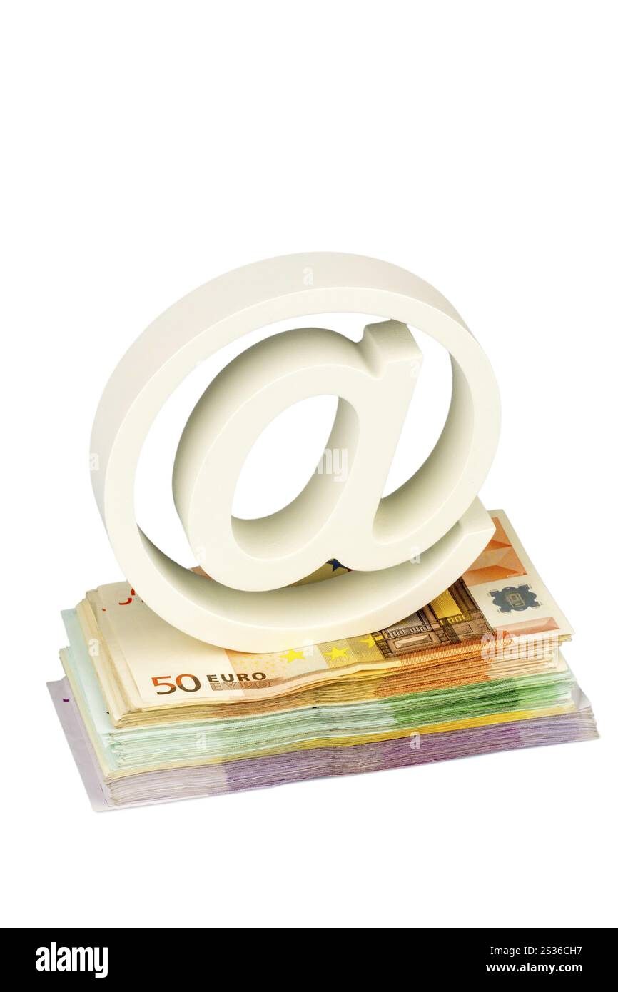 Scimmia ragno e banconote, foto simbolica per i costi IT e tassa sul copyright Austria Foto Stock