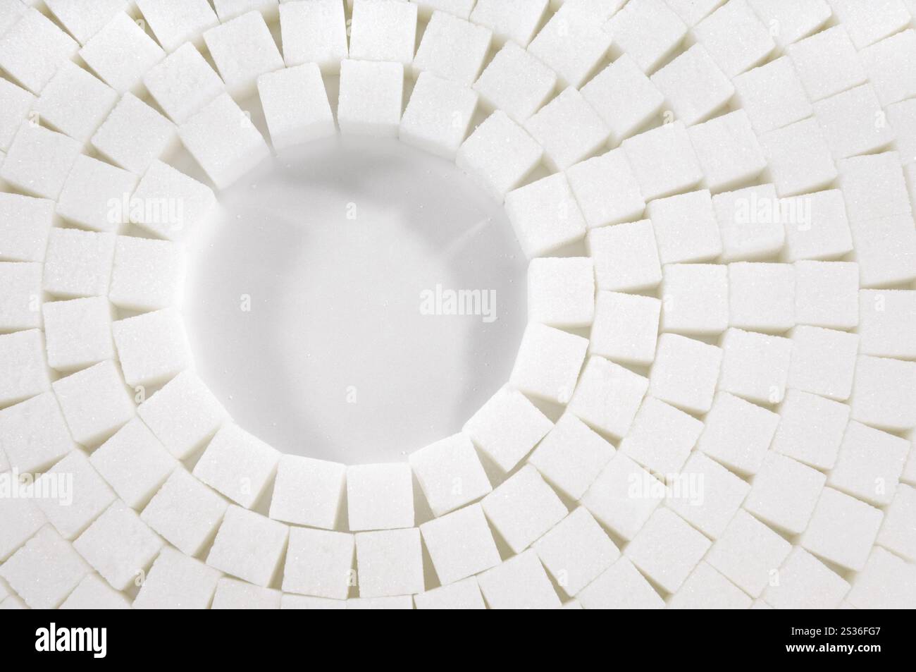 Motivo circolare astratto a cubetti di zucchero su sfondo bianco Foto Stock