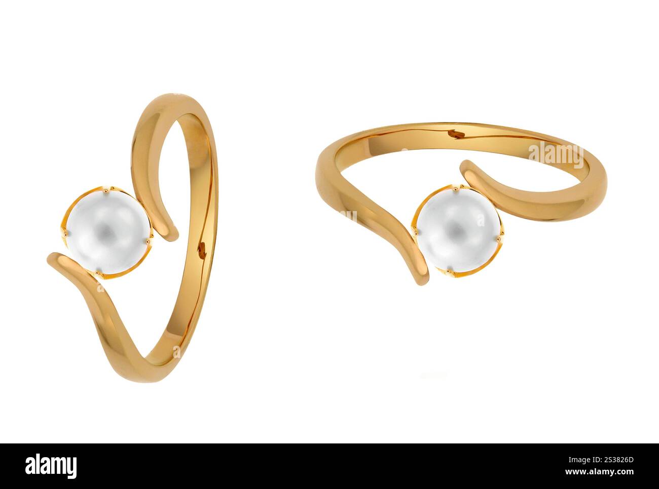 Anelli in oro con perla su bianco. Anelli in oro con perla Foto Stock