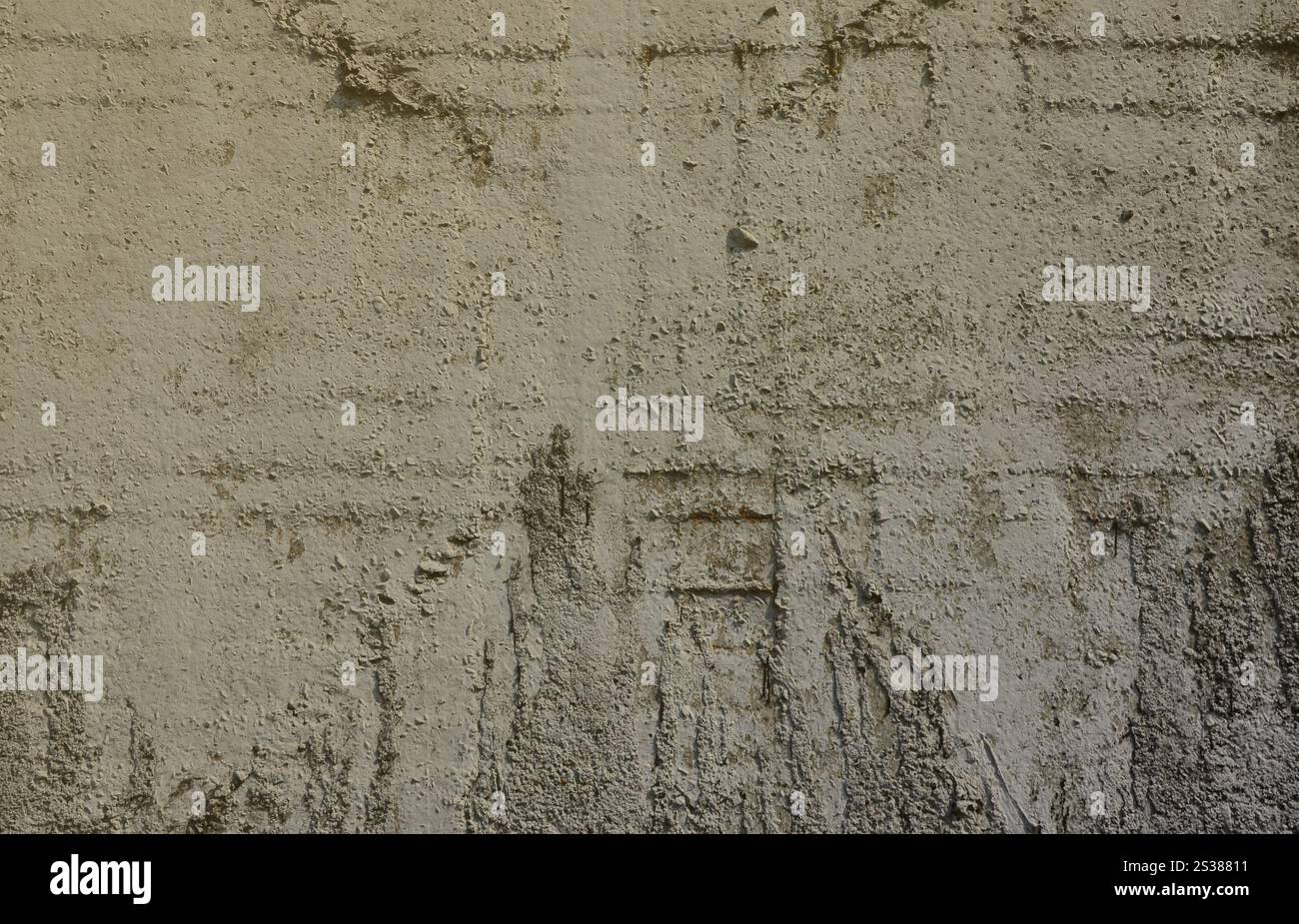 La texture del vecchio goffrato parete in calcestruzzo di colore grigio. Immagine di sfondo di un prodotto di calcestruzzo Foto Stock