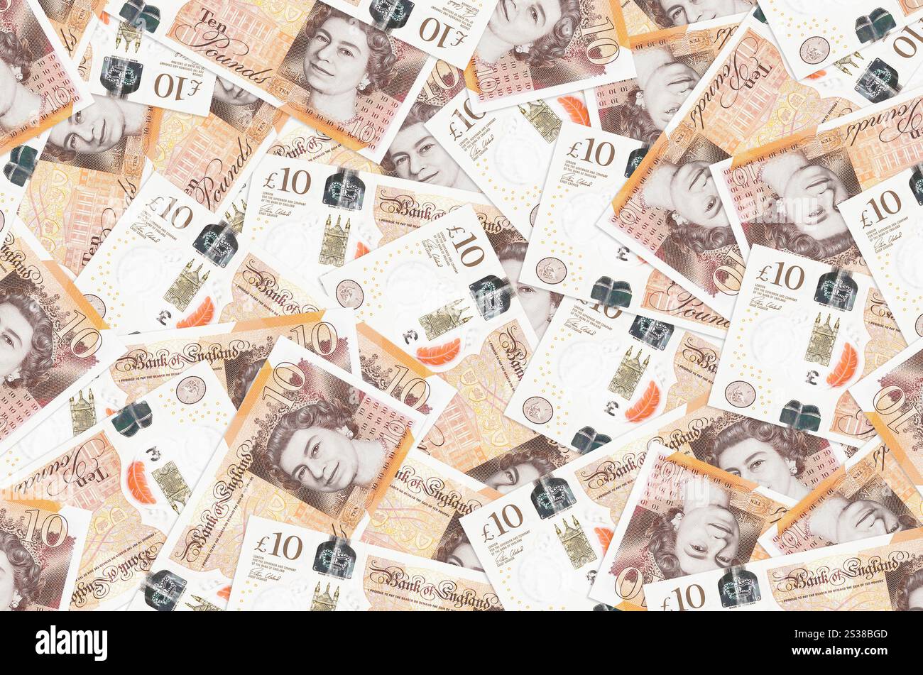 Le banconote da 10 sterline britanniche sono in grande pila. Un ricco background concettuale. Grande somma di denaro. Le banconote da 10 sterline britanniche sono in grande pila. Vita ricca Foto Stock