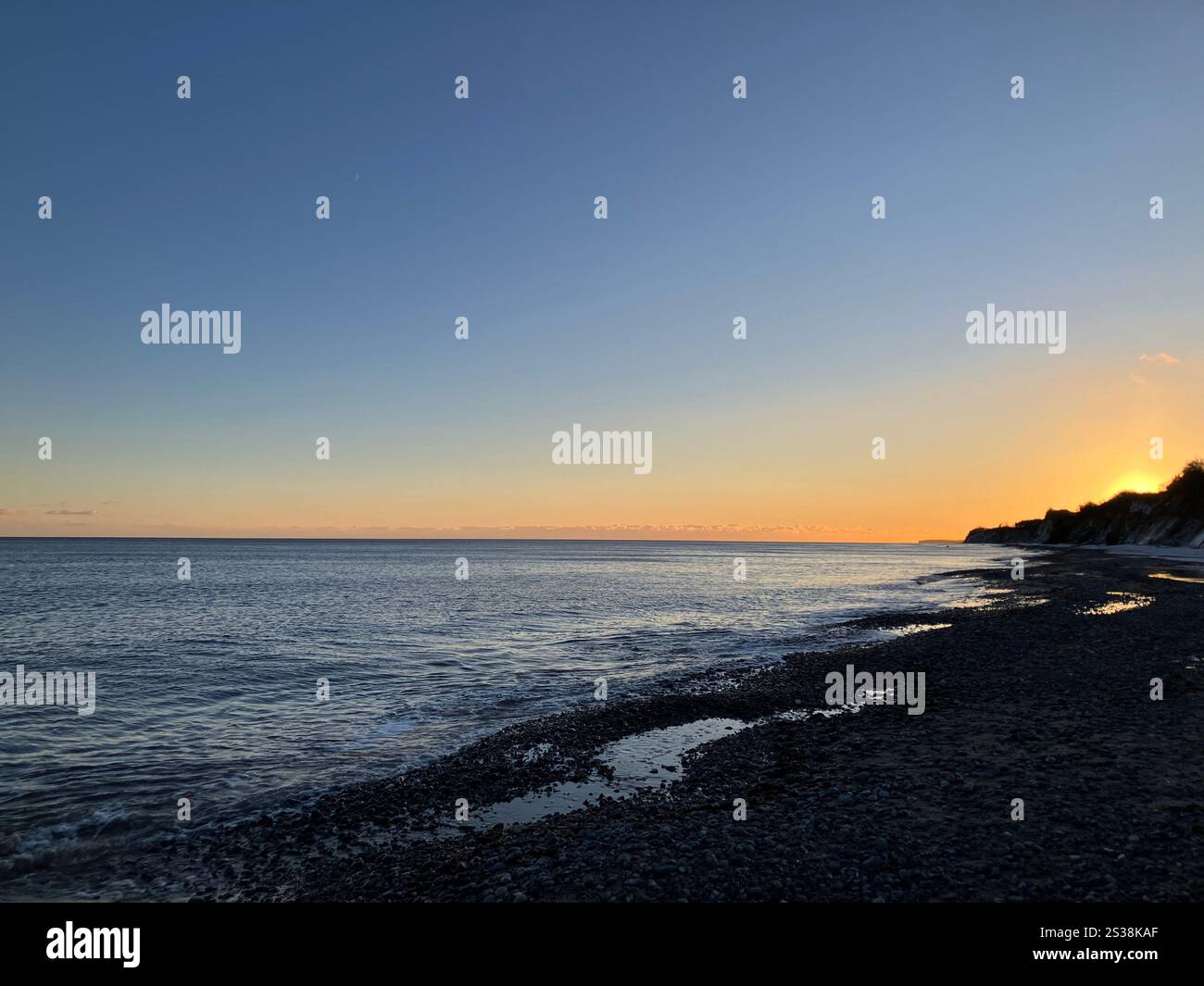 Tranquillo tramonto invernale in Danimarca Foto Stock