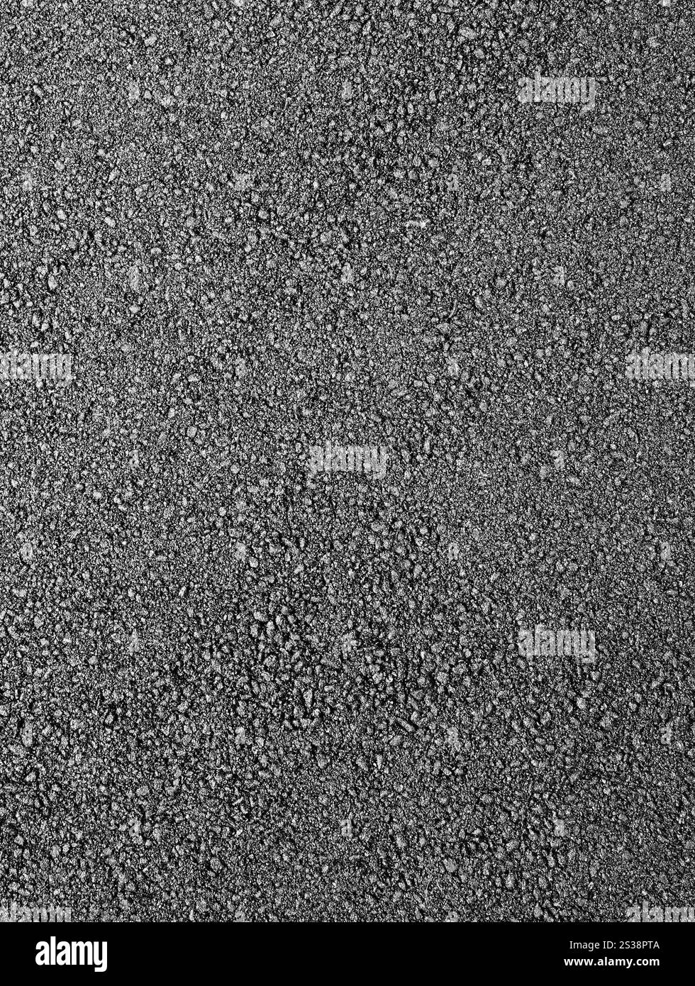 Primo piano sullo sfondo caldo dell'asfalto fresco. Asfalto fresco caldo Foto Stock