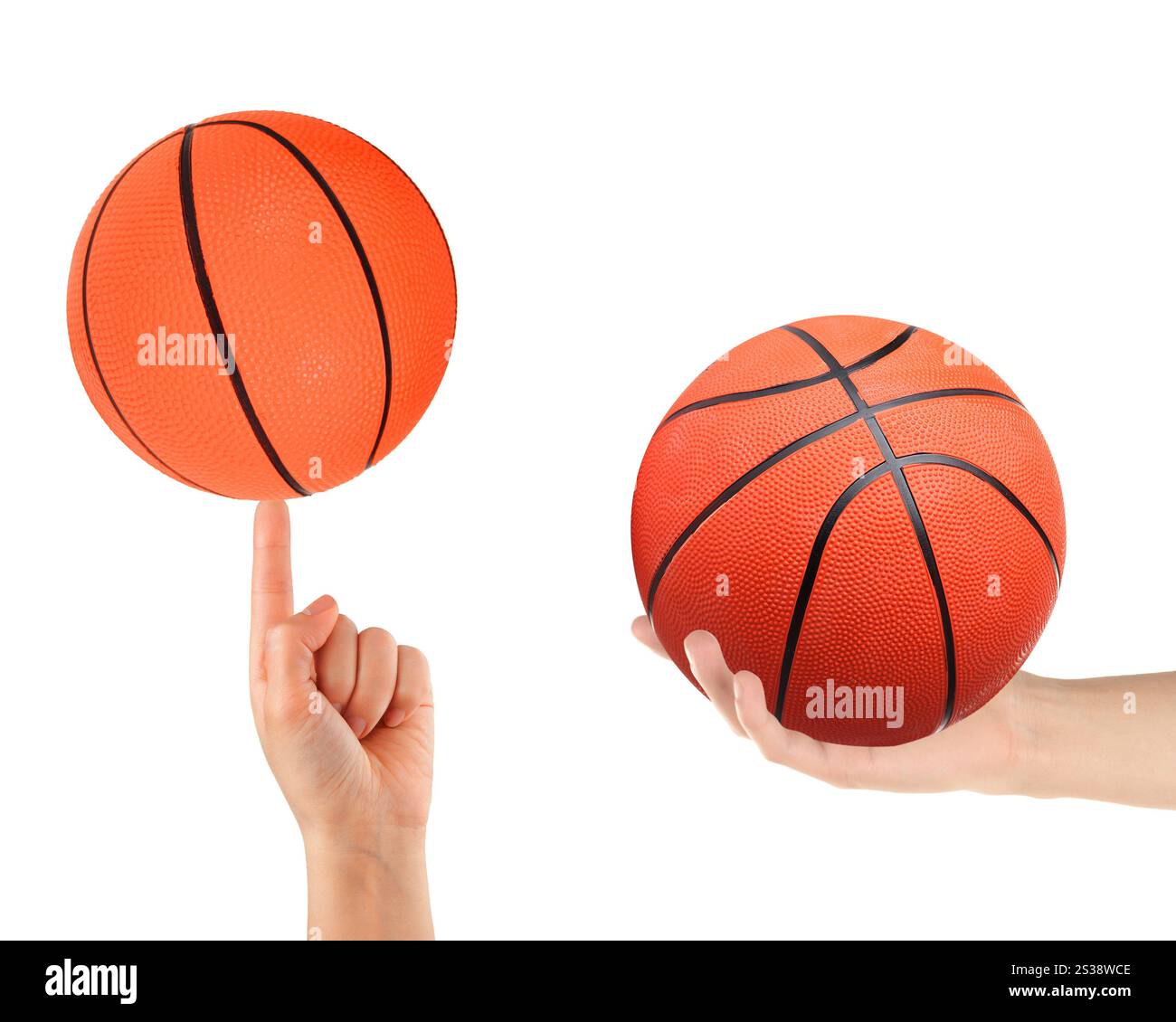 Pallacanestro su un dito e una mano isolati su sfondo bianco. Basket su dito e mano Foto Stock
