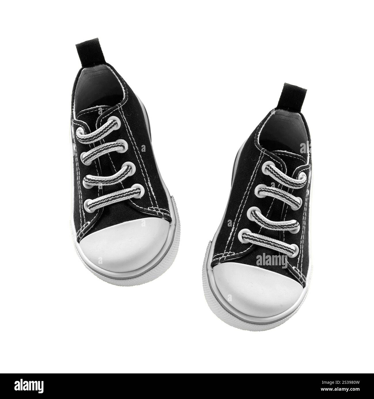 Sneaker singola in tela isolata su bianco. Sneaker singola in tela isolata Foto Stock