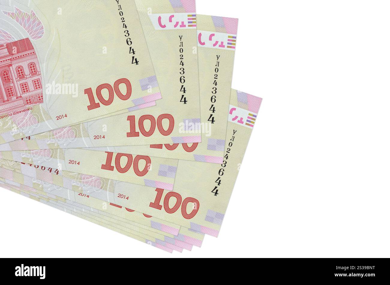 100 banconote ucraine hryvnias si trovano in un piccolo mazzo o pacchetto isolato su bianco. Mockup con spazio di copia. Concetto di business e cambio valuta. 100 Foto Stock