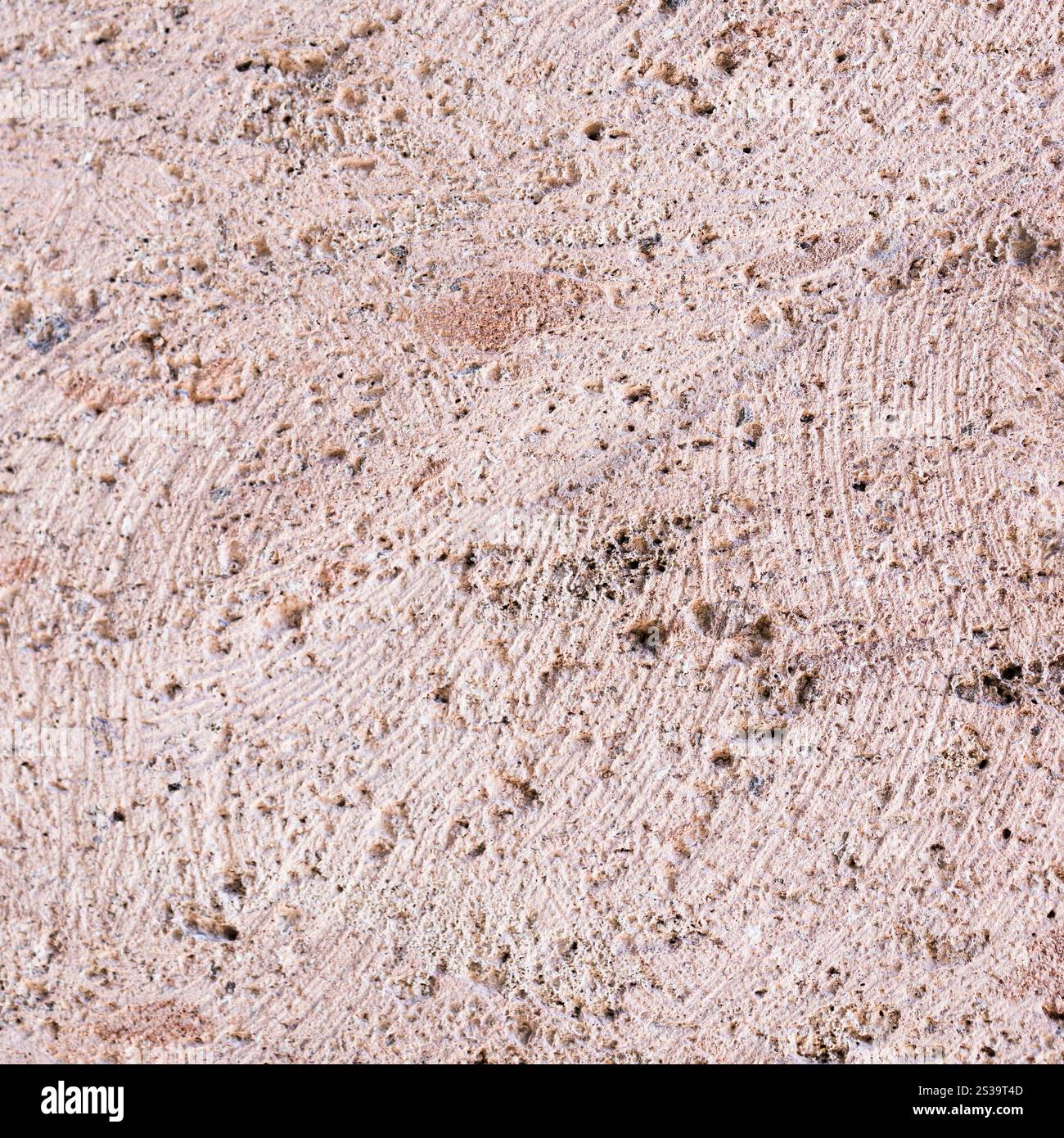 consistenza quadrata lucida di piastrelle da parete in tufo armeno marrone rosa Foto Stock