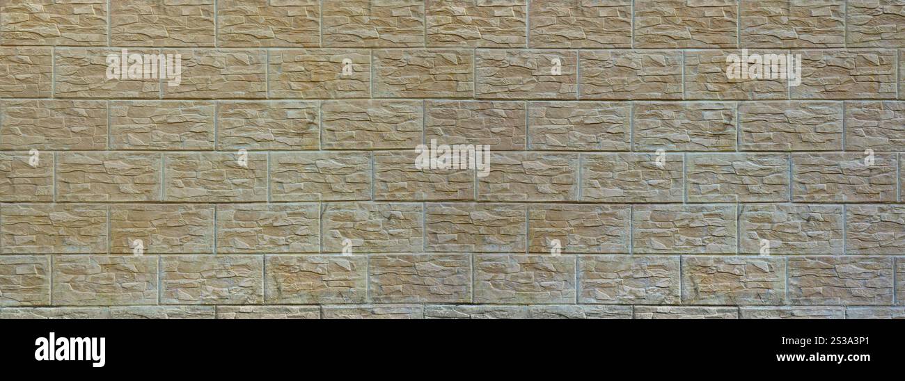 Parete di luce texture piastrelle, stilizzato in apparenza come un mattone. Uno dei tipi di decorazione murale Foto Stock