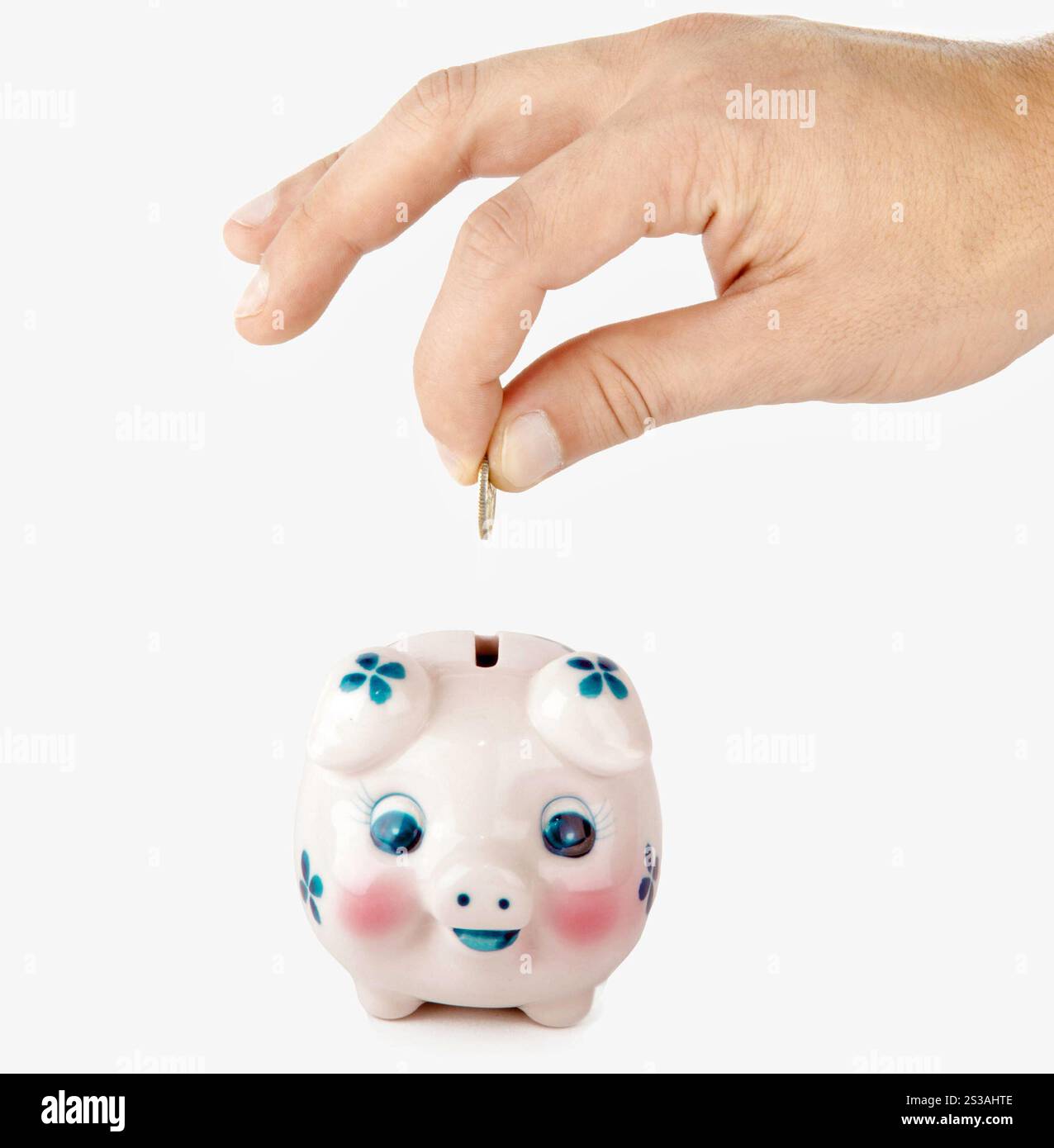 mano con monete isolate su sfondo bianco. mano con le monete Foto Stock