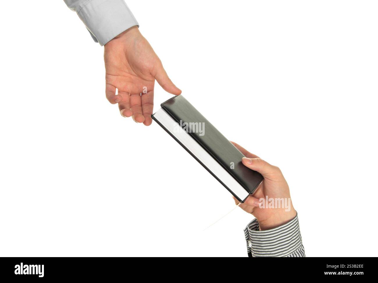 Mano che tiene un libro isolato su sfondo bianco. Mano che tiene un libro Foto Stock