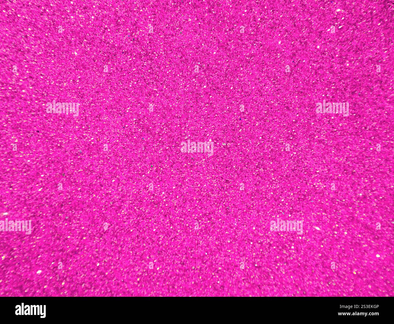 Sfondo rosa sfocato con scintille per il testo. Sfondo luminoso per le feste per le congratulazioni. Foto Stock