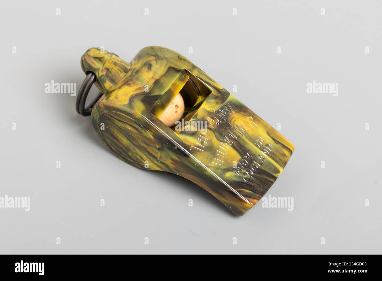 Acme Thunderer con motivo a turbolenza in plastica, dimensioni ridotte Foto Stock