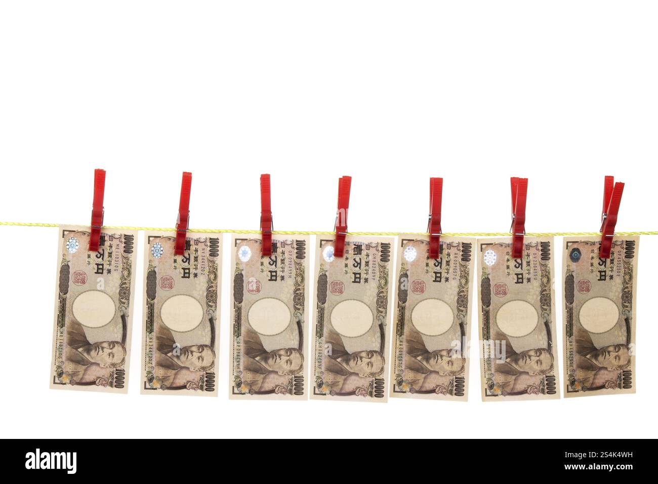 Simbolo del riciclaggio di denaro con YEN giapponesi sulla clothesline Foto Stock