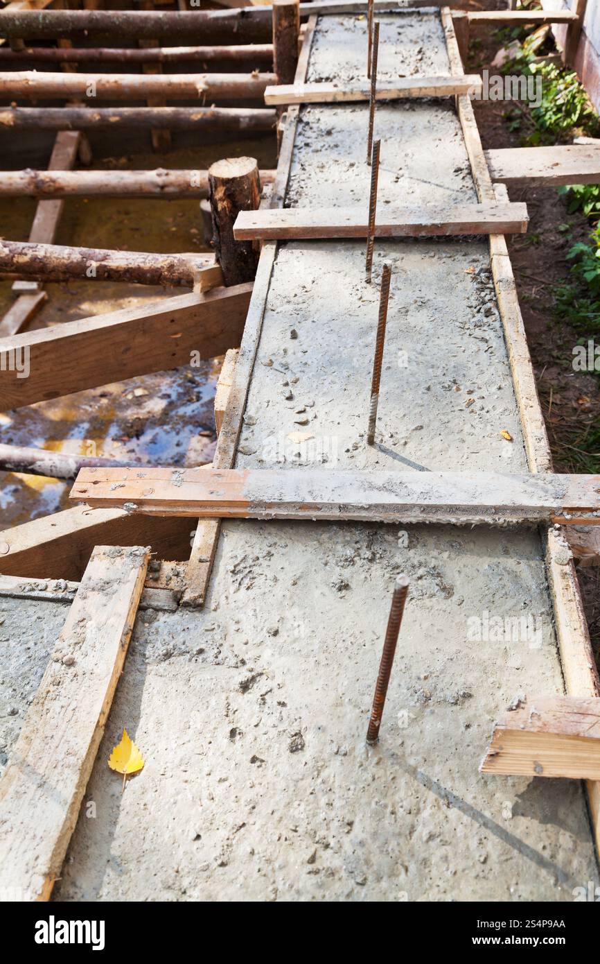 Casseri in legno fondamenta in calcestruzzo di casa Foto Stock