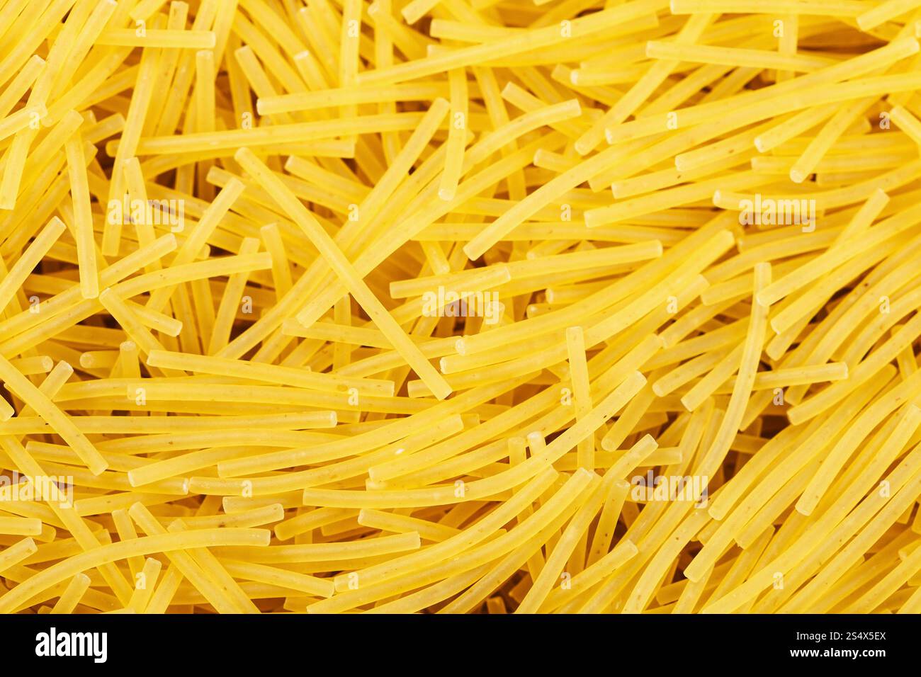 Sfondo di cibo - semola di grano duro Pasta filini Foto Stock