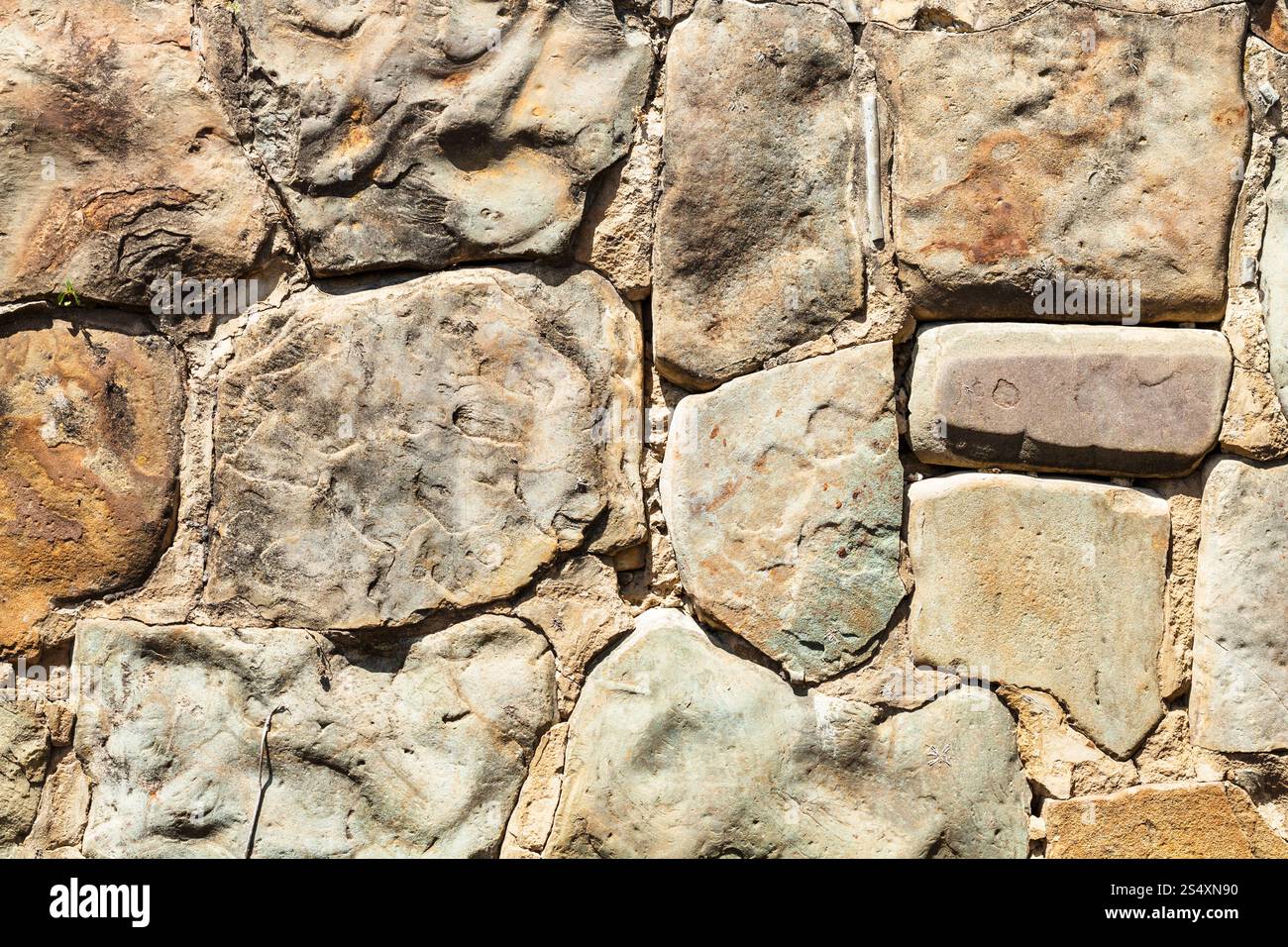 Textured background - Parete esterna da massi naturali Foto Stock