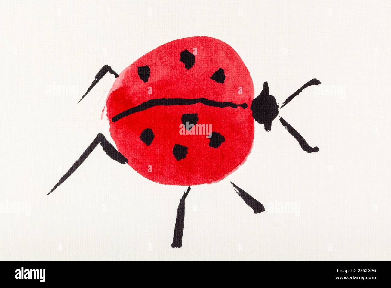 Pittura a mano in sumi-e stile sulla carta di crema - una coccinella disegnata da acquerelli Foto Stock