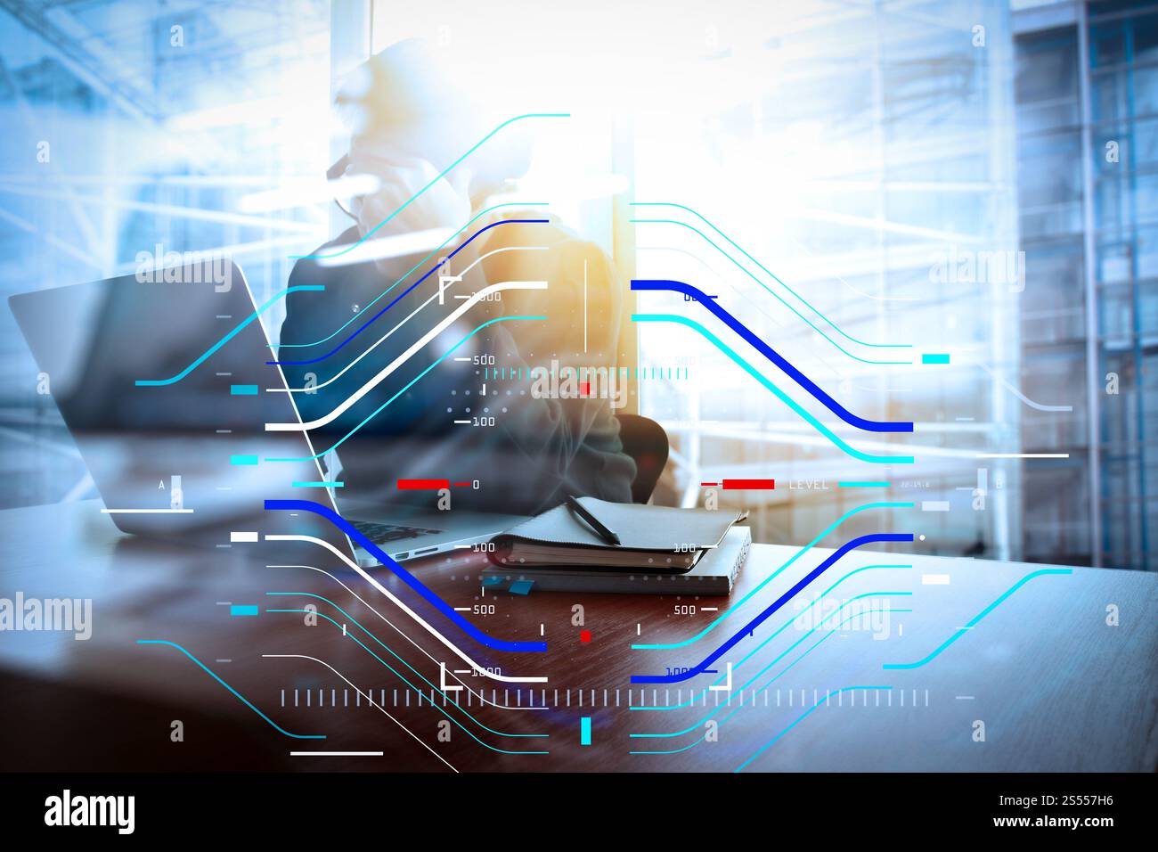 Concetto di focalizzazione sul target con diagramma digitale. Giovane designer creativo che lavora in ufficio con computer portatile come concetto Foto Stock