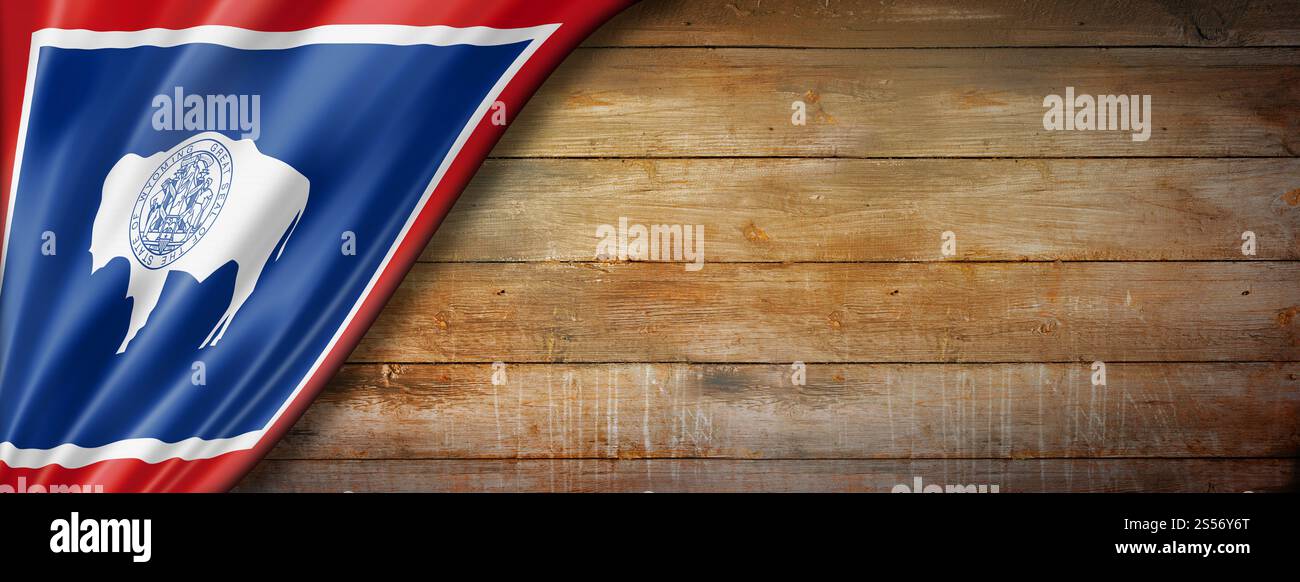Bandiera del Wyoming sul vecchio banner da parete in legno, USA. Illustrazione 3D. Bandiera del Wyoming sul vecchio banner da parete in legno, USA Foto Stock