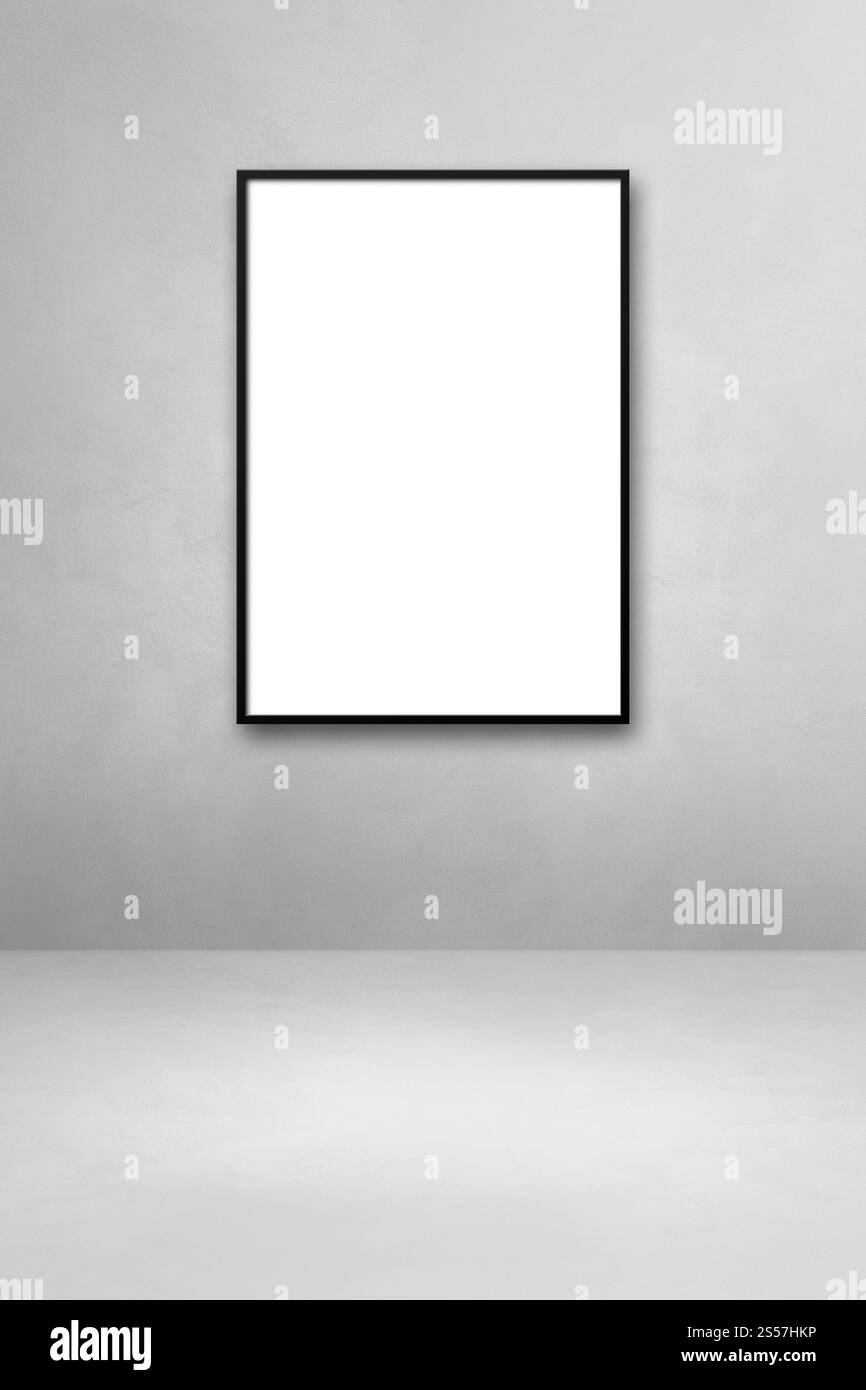 Cornice nera appesa a una parete grigio chiaro. Modello di mockup vuoto. Cornice nera appesa a una parete grigio chiaro Foto Stock