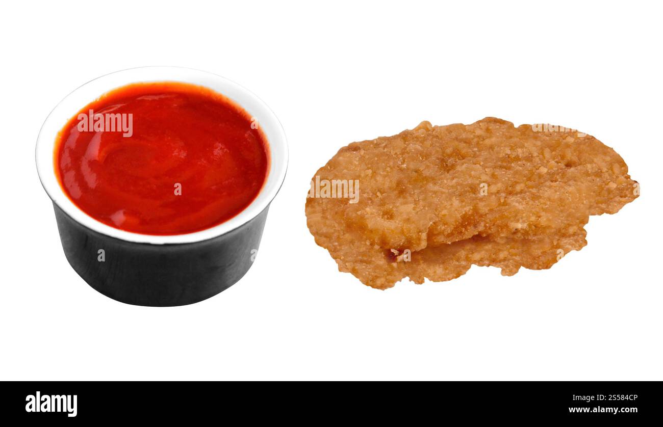 Pepite di pollo fritta e ketchup Foto Stock