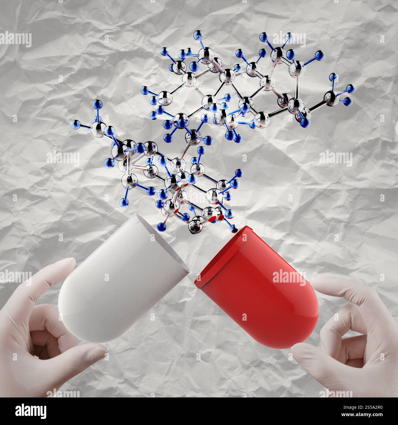 Le mani aperte capsula molecola mostrano su carta sgualcita background come concetto medico Foto Stock