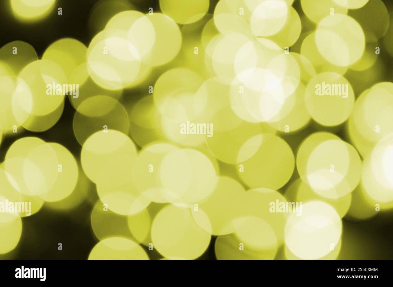 Effetto bokeh di fondo giallo oro luce sfocati sullo sfondo. Le luci di Natale Concept Foto Stock