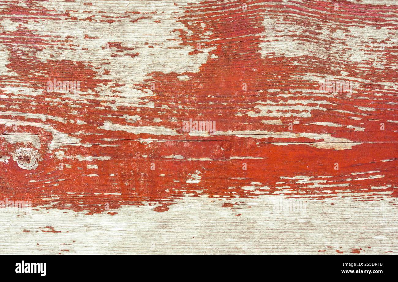 Vecchia struttura in legno verniciato di rosso. Sfondo. Vecchia struttura in legno verniciato di rosso Foto Stock