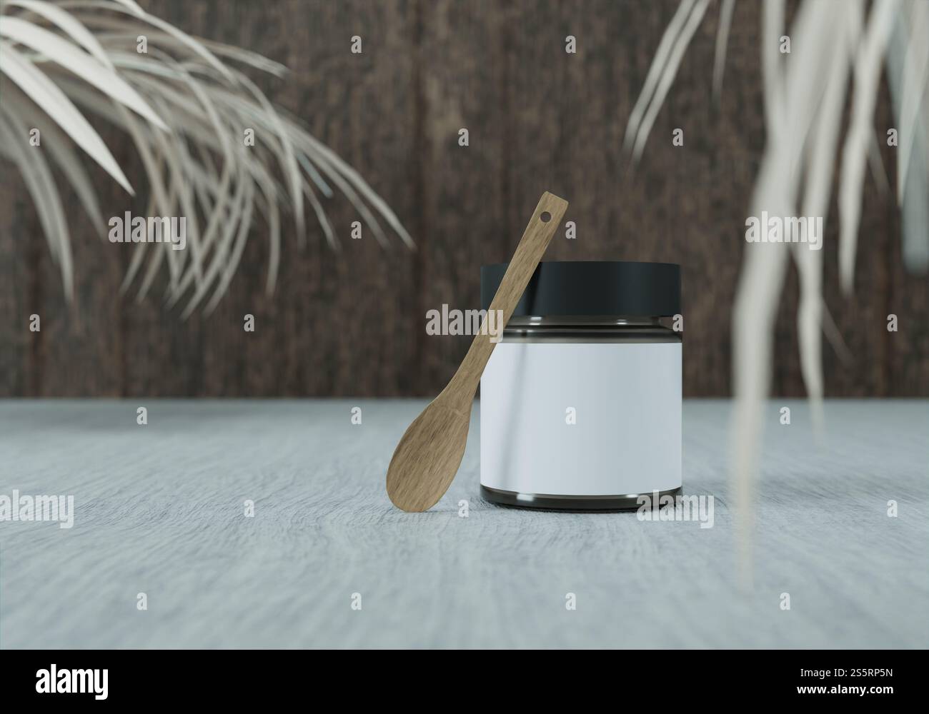 Un vasetto di marmellata e un cucchiaio di legno su sfondo bianco Foto Stock