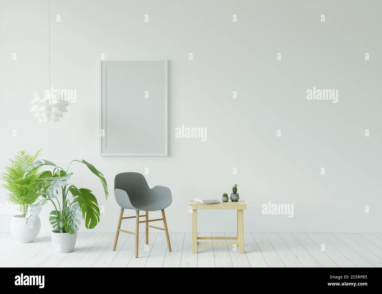 Soggiorno decorato con sedie, cornici e piccole pentole Foto Stock