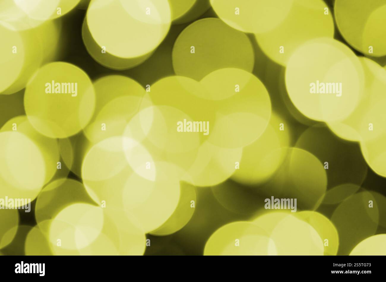 Effetto bokeh di fondo giallo oro luce sfocati sullo sfondo. Le luci di Natale Concept Foto Stock