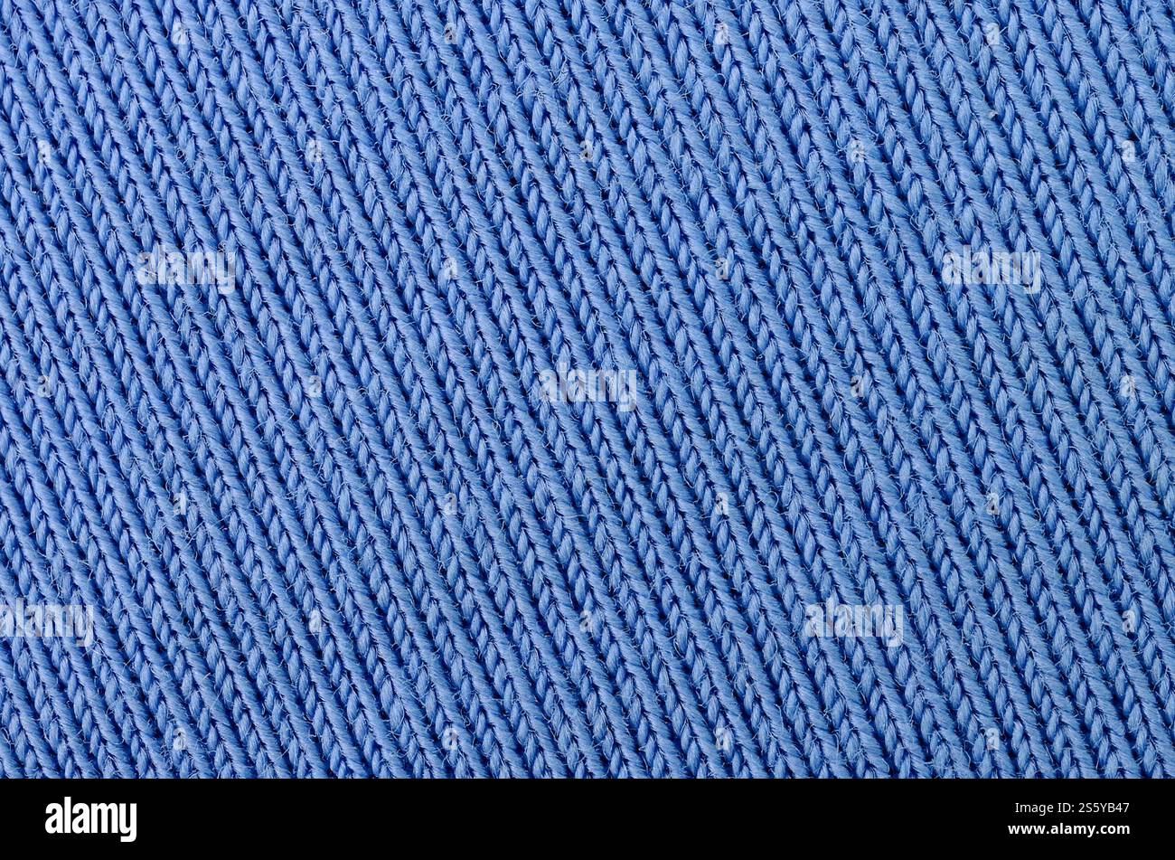 La trama del tessuto in colore blu. Materiale per la realizzazione di camicie e camicette Foto Stock