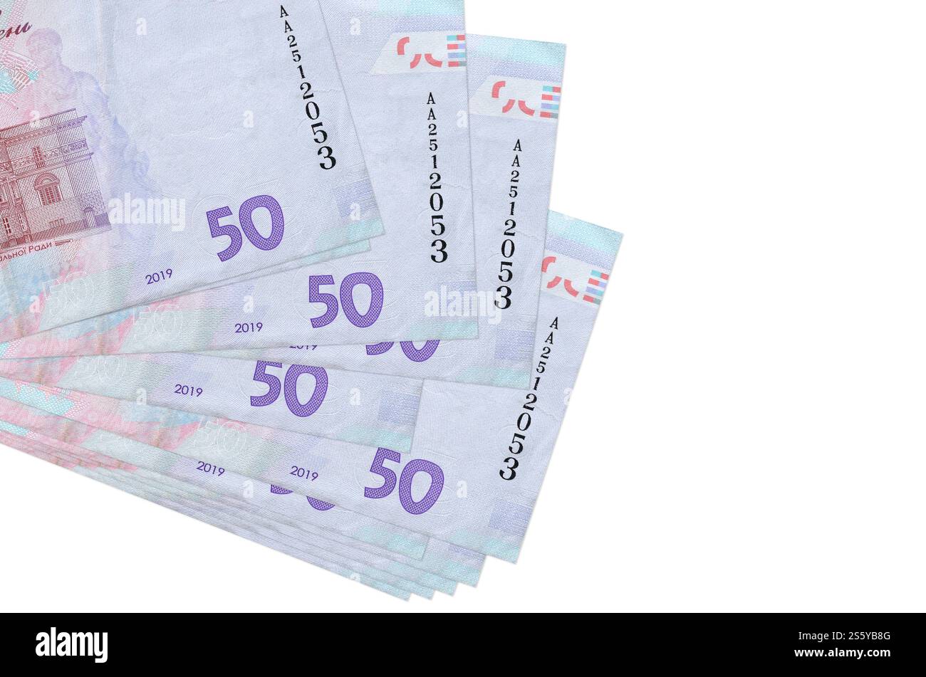50 banconote ucraine hryvnias si trovano in un piccolo mazzo o pacchetto isolato su bianco. Mockup con spazio di copia. Concetto di business e cambio valuta. 50 Foto Stock
