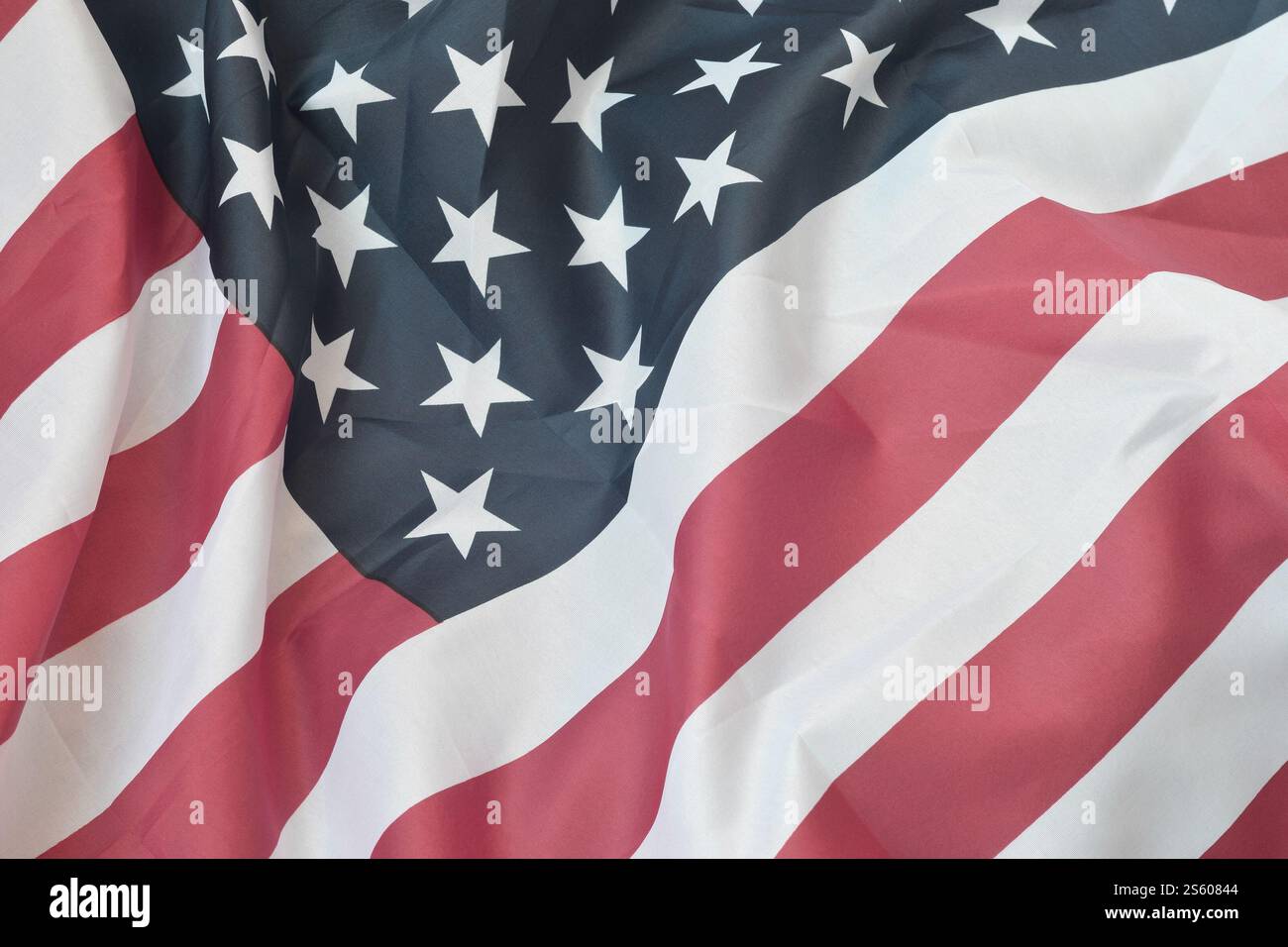 Stati Uniti d'America che sventolano bandiera con molte pieghe. Sfondo patriottico per il design delle festività americane. Stati Uniti d'America sventolando bandiera con Foto Stock