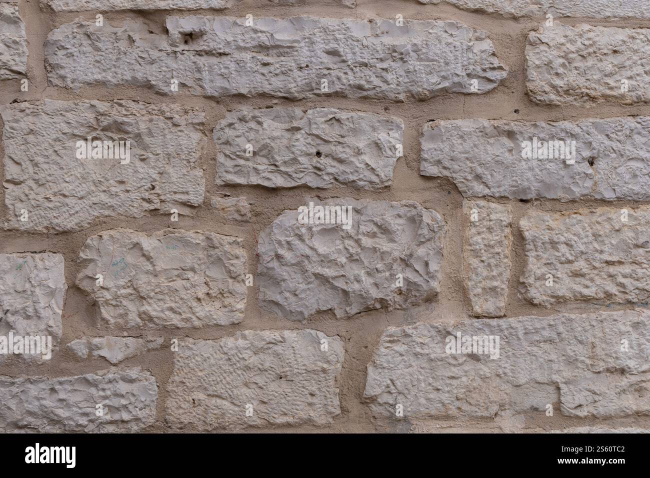 Pareti in pietra posate a mano, città vecchia di Betlemme, artigianato antico, struttura storica, fascino rustico, patrimonio sacro, bellezza senza tempo, architettura vintage Foto Stock