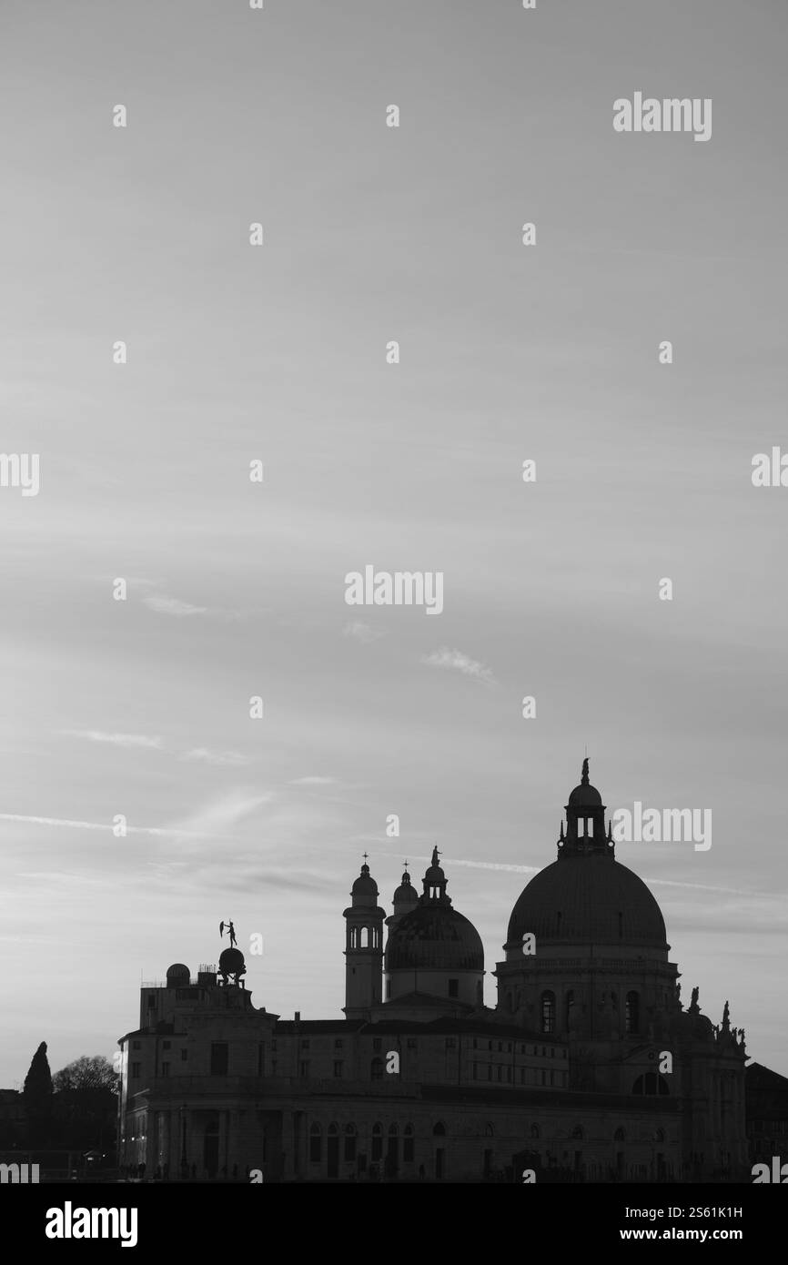 Silhouttes al tramonto a Venezia Foto Stock