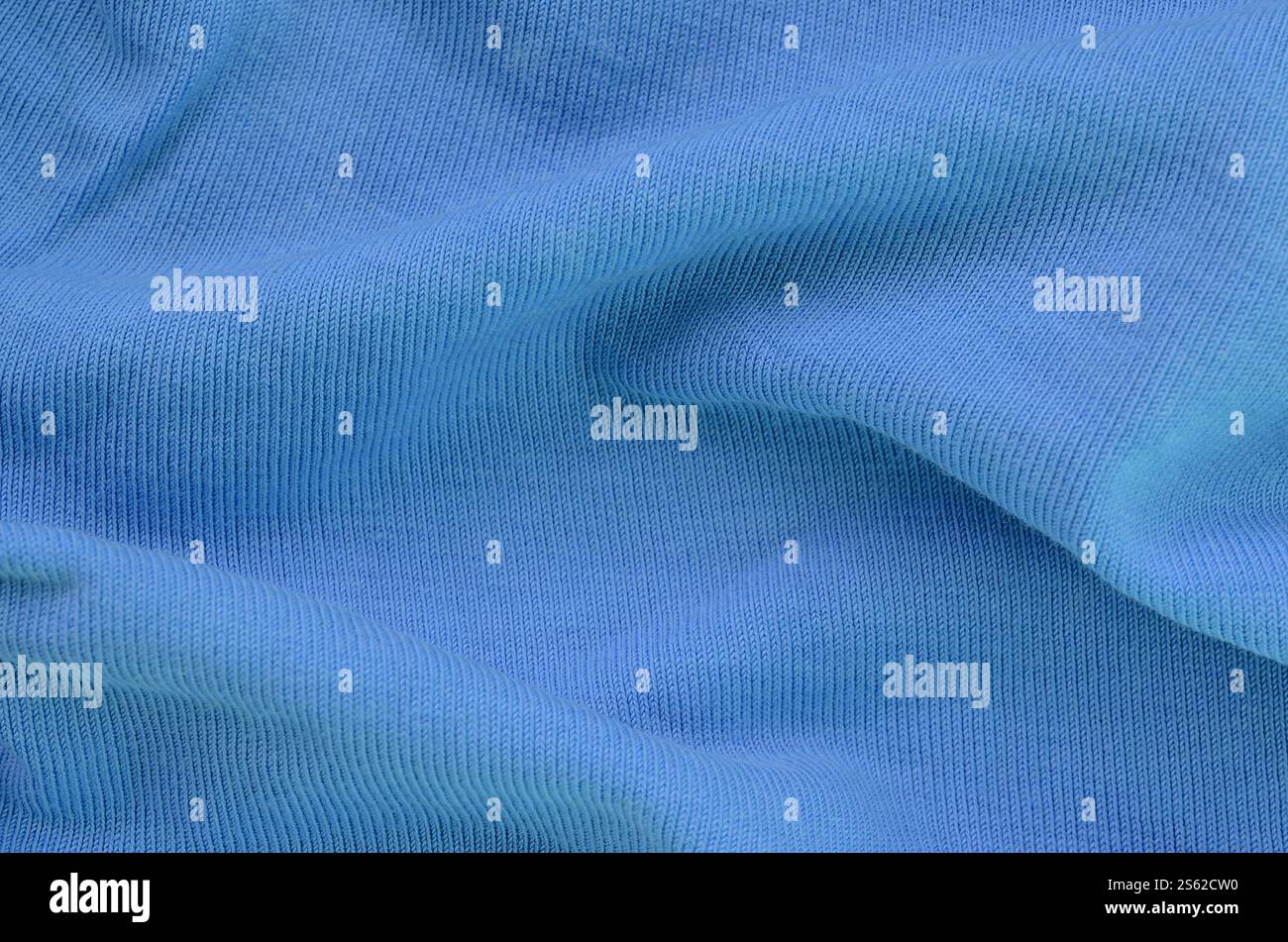 La trama del tessuto in colore blu. Materiale per la realizzazione di camicie e camicette Foto Stock