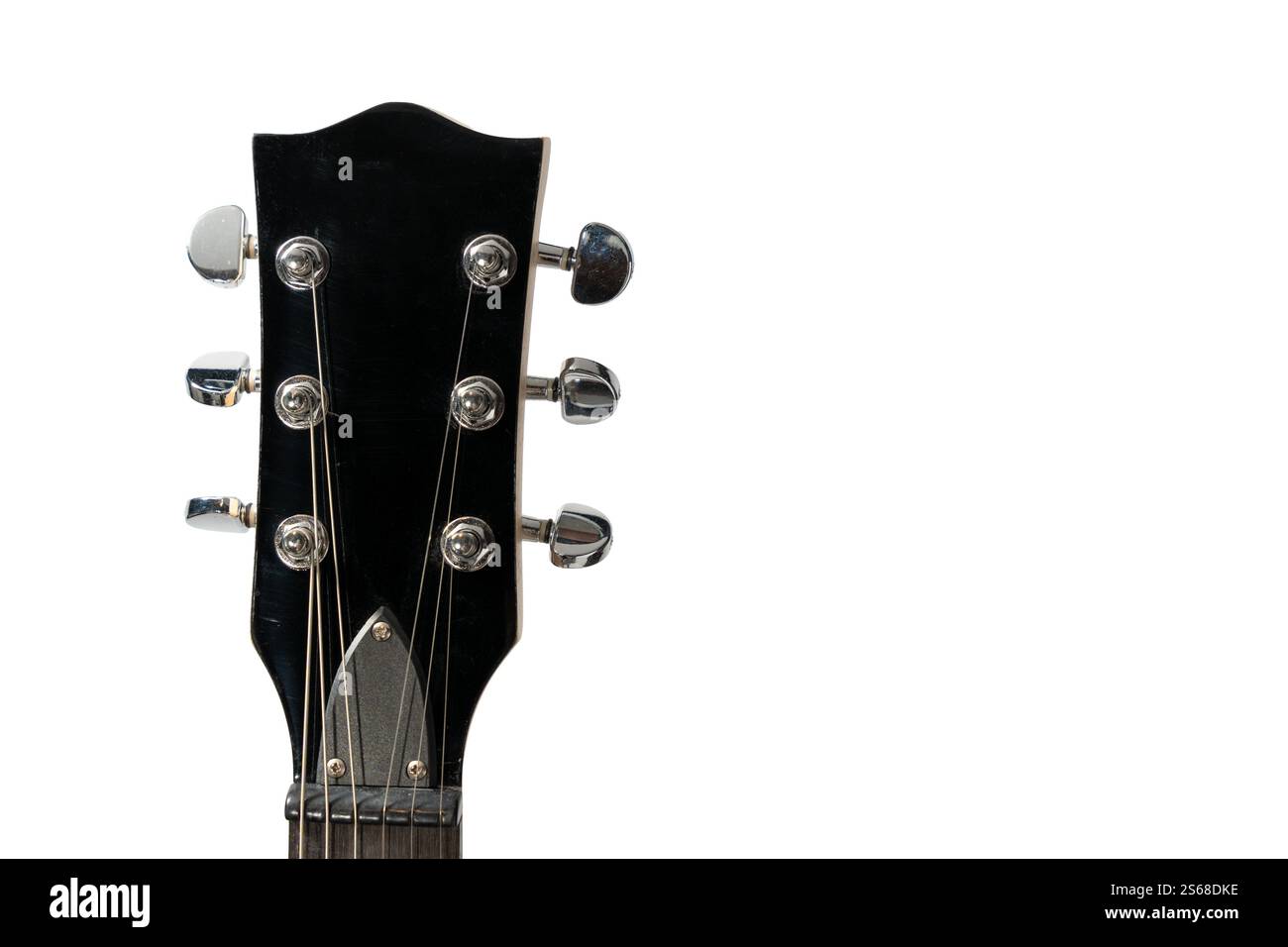 Un primo piano di una paletta di chitarra. La testa è nera e argento. La testa è la parte della chitarra che tiene le corde Foto Stock