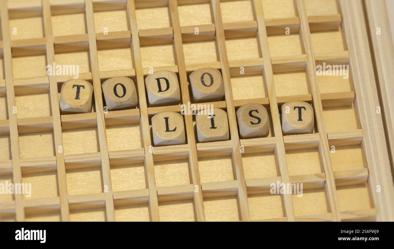 L' immagine di un dado di legno todo list Foto Stock