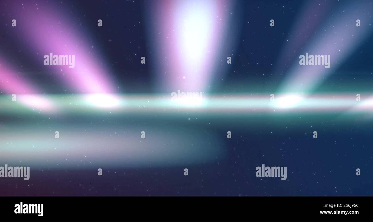 Immagine di tracce di luce e macchie su sfondo nero Foto Stock